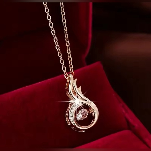 18K Gold Phoenix Heart Diamond In Motion Pendant Necklace - Picture 3 of 5